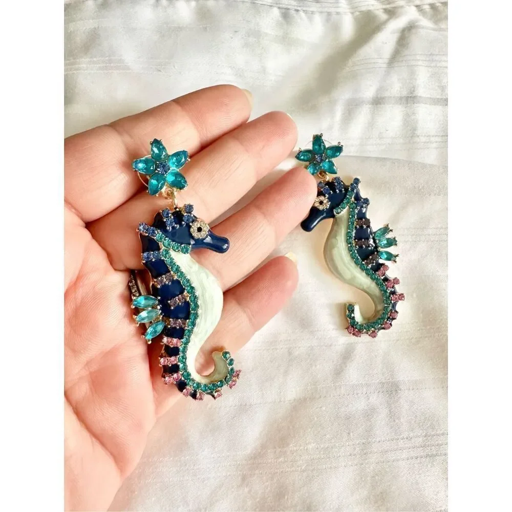 Navy blue and rhinestone seahorse dangle earrings ￼